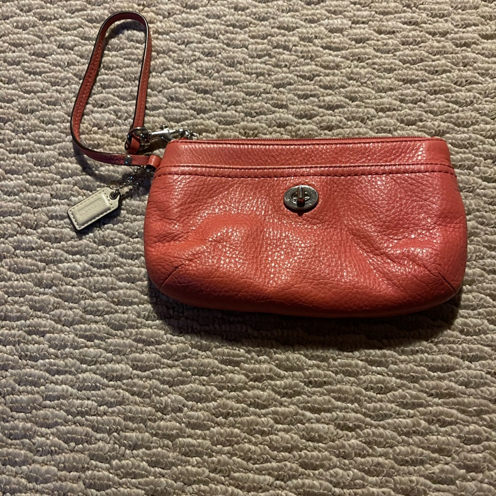 Coral coach leather wristlet